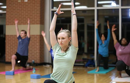 People in yoga class.